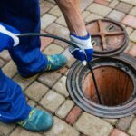 Plumber hydro-jetting a restaurant.